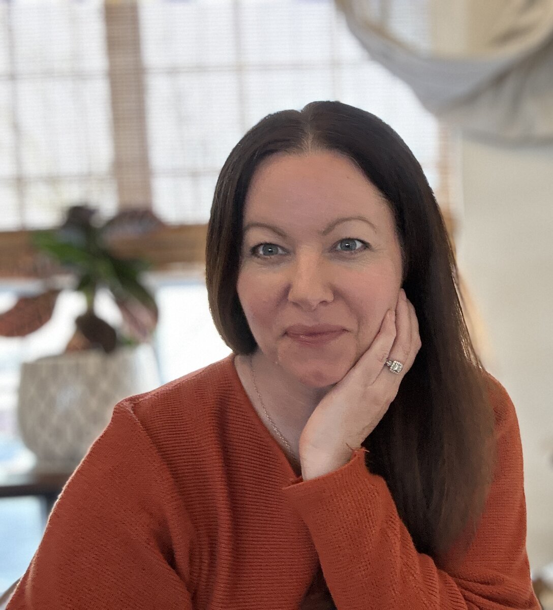 Jamie at her desk, working through an AI build