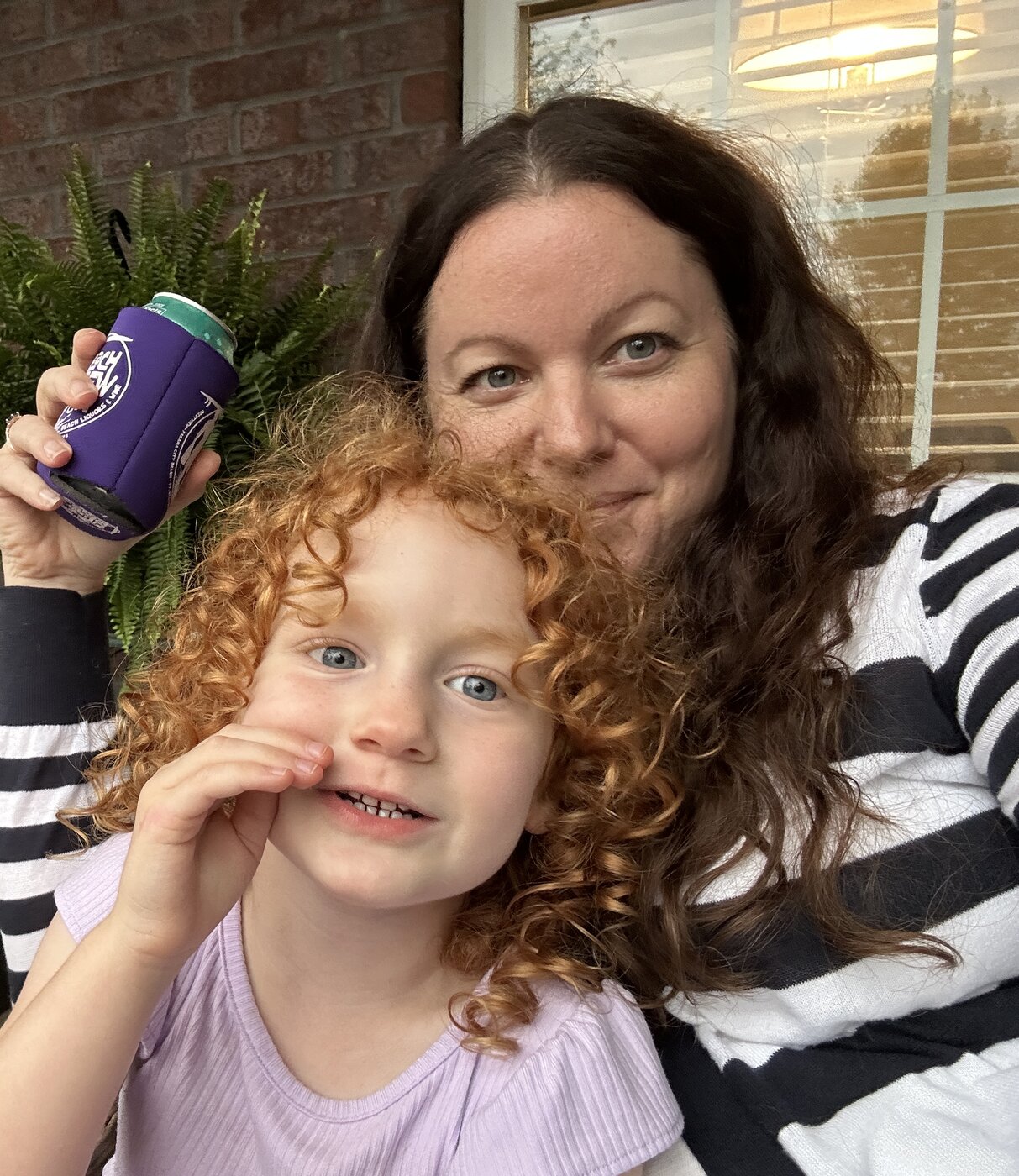 Jamie with her granddaughter Margot on the back porch